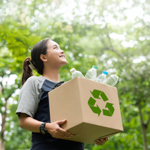 Woman Holding a Box Recycling Concept