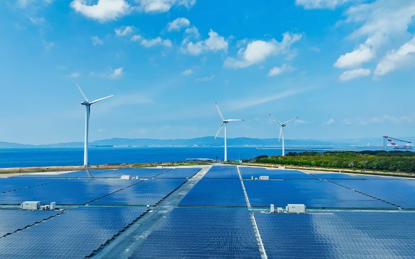 Aerial view of a hybrid wind and solar power plant