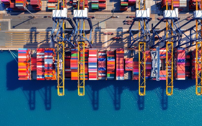 Aerial View of Cargo Ship and Cargo Container in Harbor