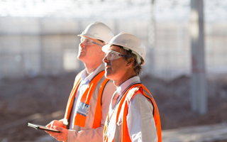 Auditors at a construction site