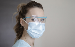 Medical Staff Wearing Safety Visor and Protective Mask