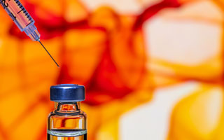 Syringe and Medicine Bottle